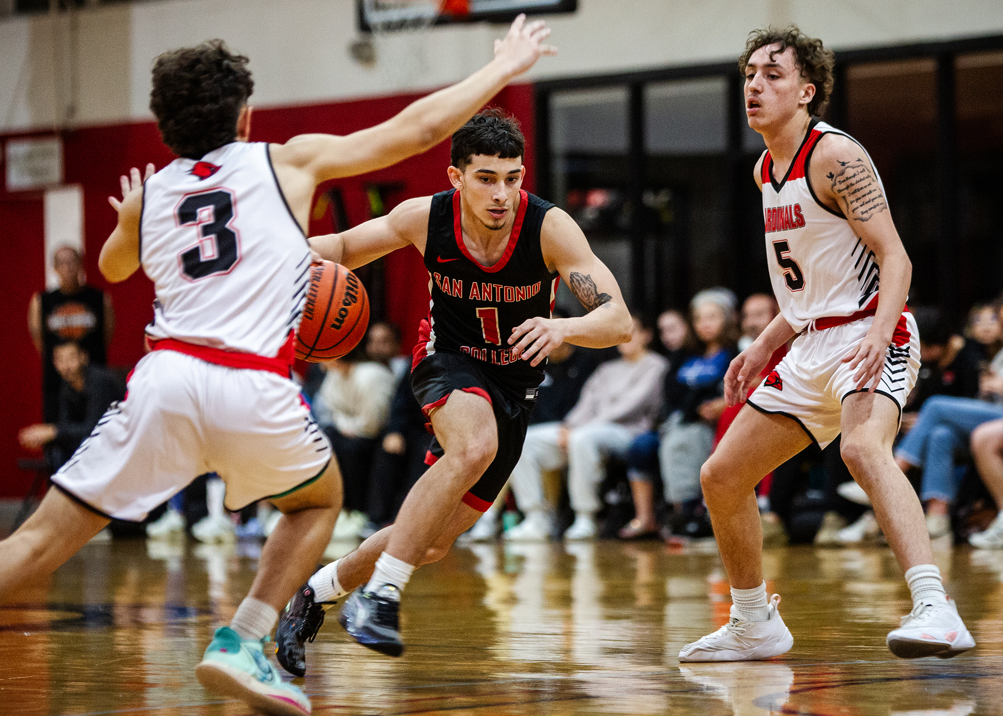 Eli Rodriguez drives through defenders. Photo by A. De Leon