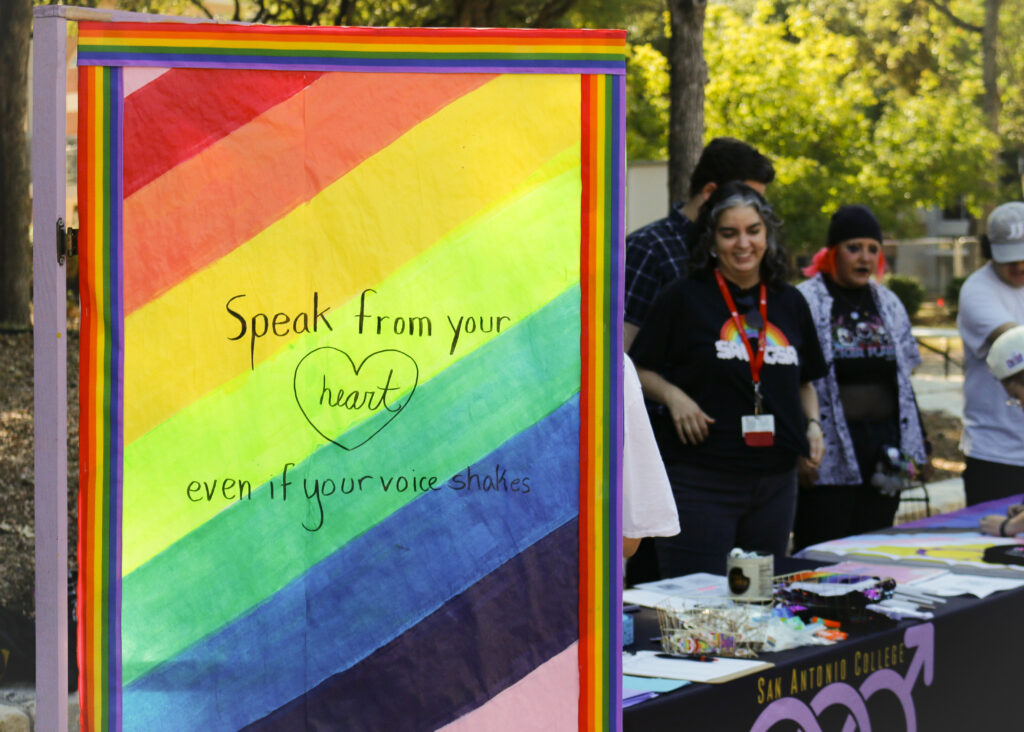 GSA officer Bridgette Phillips painted a “closet door” exhibit on which queer students shared their coming out stories. The door read “Speak from your heart even if your voice shakes.” Photo by D.J. Agleton