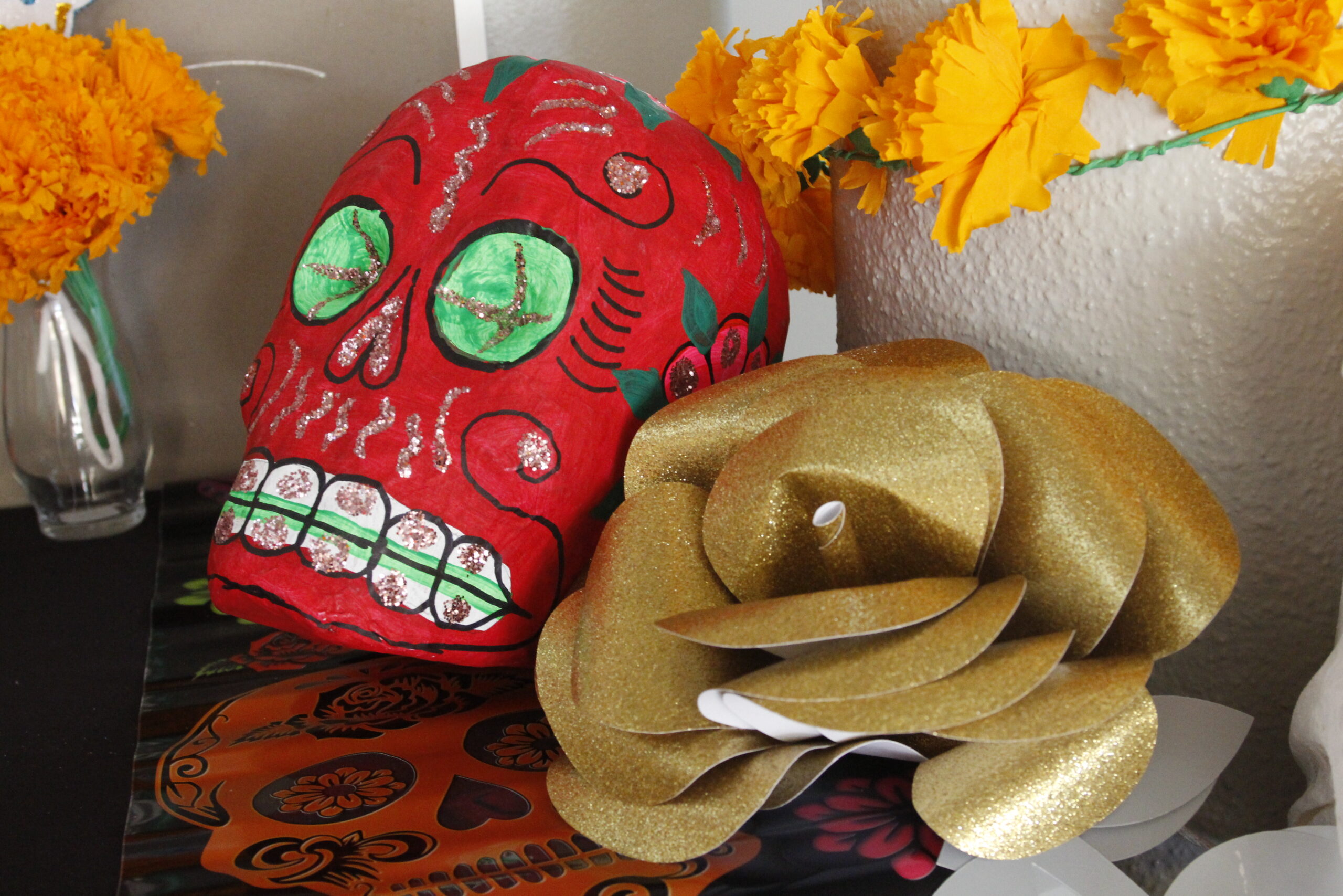 Dia De Los Muertos decorations adorn SAC’s ofrenda in the Loftin Student Center atrium. Photo by Natalia Edwards.