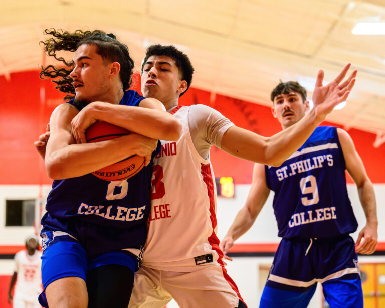 SAC Forward Luke Lopez defends in the post at SAC's Candler Physical Education Center Oct. 23. Photo by A. De Leon.