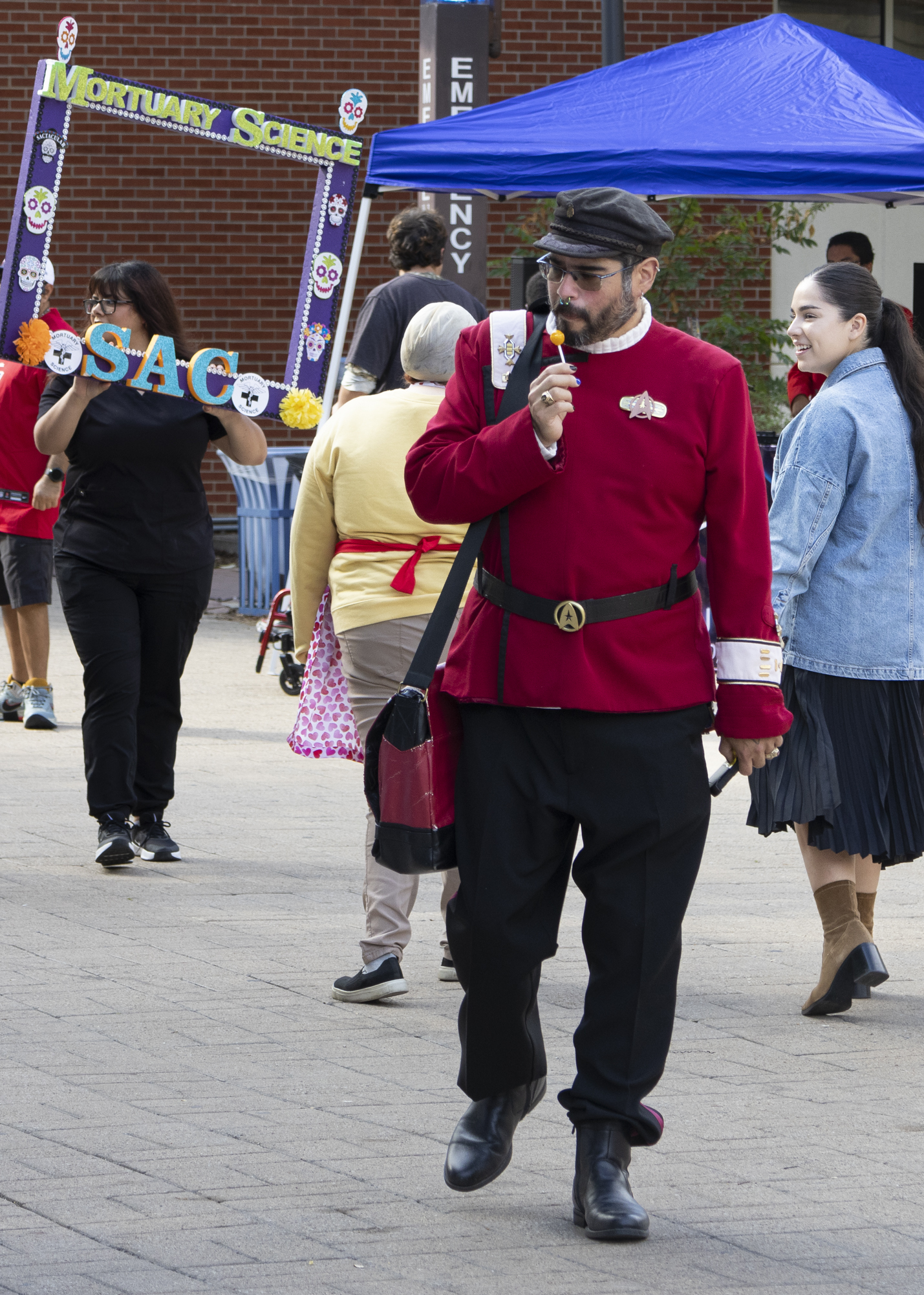 A Starfleet member enjoys a piece of candy at SAC’s Screamfest Thursday. Photo by Natalia Edwards.