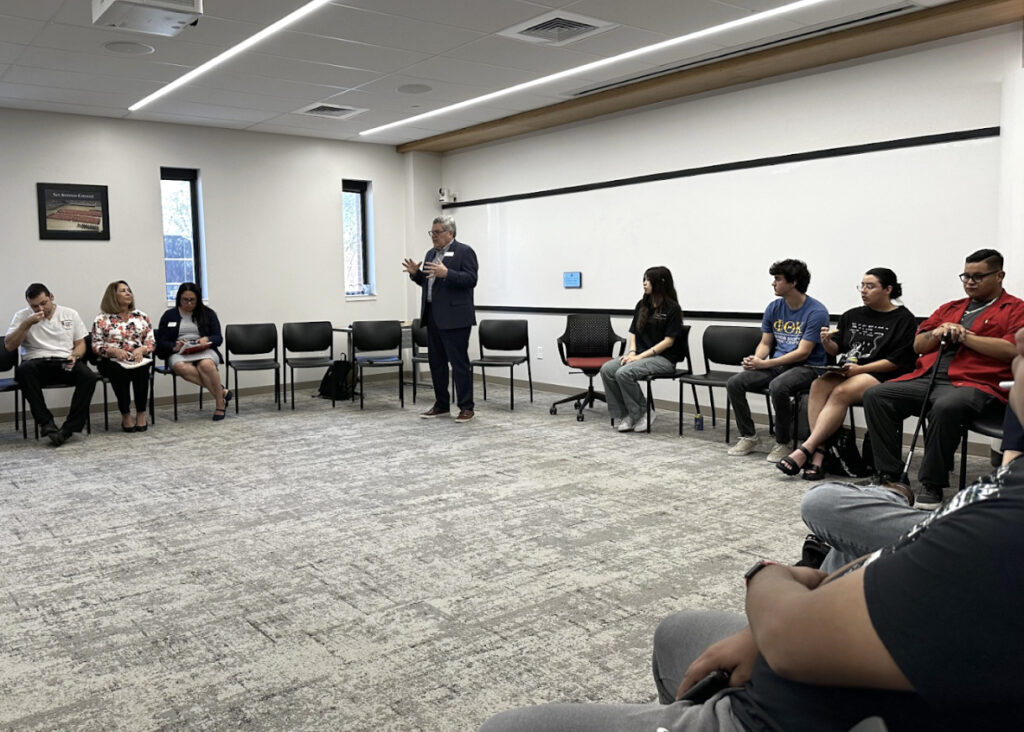 Interim President Dr. Francisco Solis addresses students at a “Pizza With the President” Oct. 16 in the Fletcher Administration Building. Photo by Aaron Martinez.