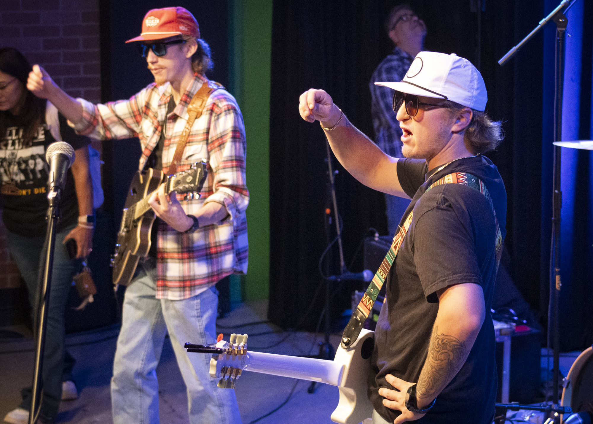 Members of “John Brewer Band” request audio adjustments in Studio B of the Radio Television, and Film building Oct. 15. Photo by Pablo Viveros.