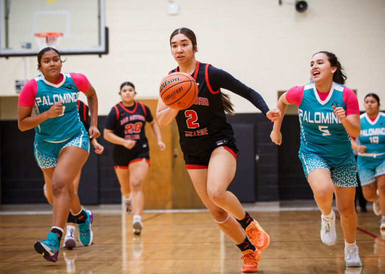 SAC’s Devyn Castillo drives past PAC defenders at the Abraham Kazen Middle School Gym Oct. 9. Photo by A. De Leon.