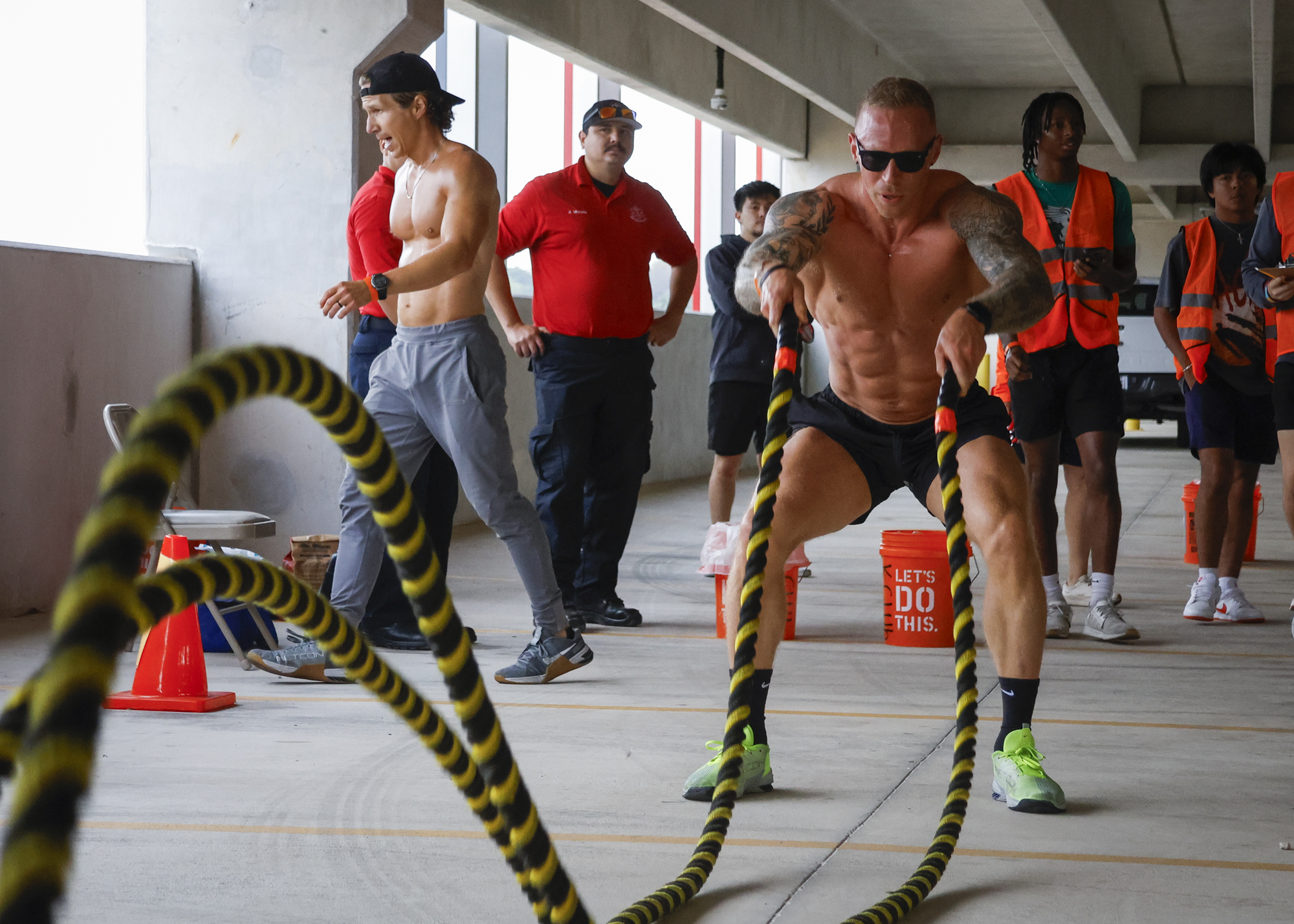 SAC Assistant Professor of Philosophy Dan Herrick completes the rope-slam station at the Backyard Beast Team Fitness Challenge at Parking Garage 3 Nov. 1. Photo by D.J. Agleton.