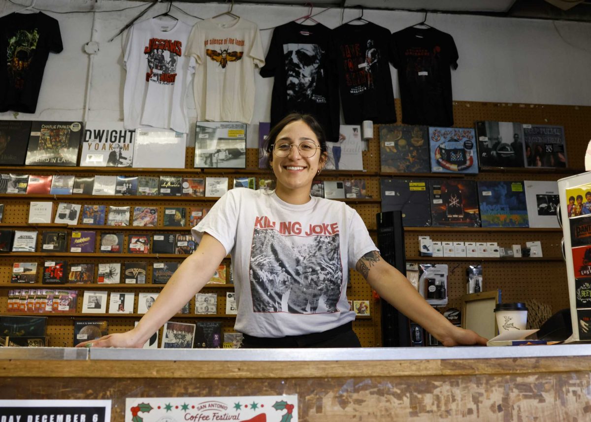 Hogwild employee Ryann Palacios, a former SAC student, stands proudly at the front desk Nov. 25. Photo by D.J. Agleton.