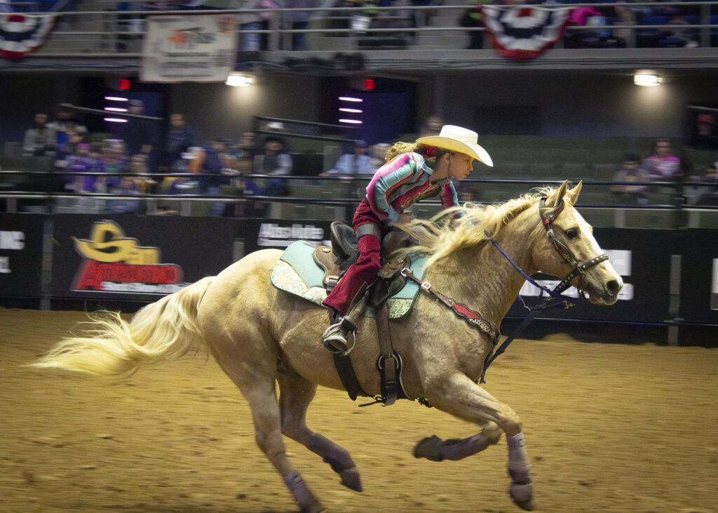 Youth barrel racer finishes her race at the San Antonio Stock Show and Rodeo. Feb 12th. Photo by Catie Broadus.