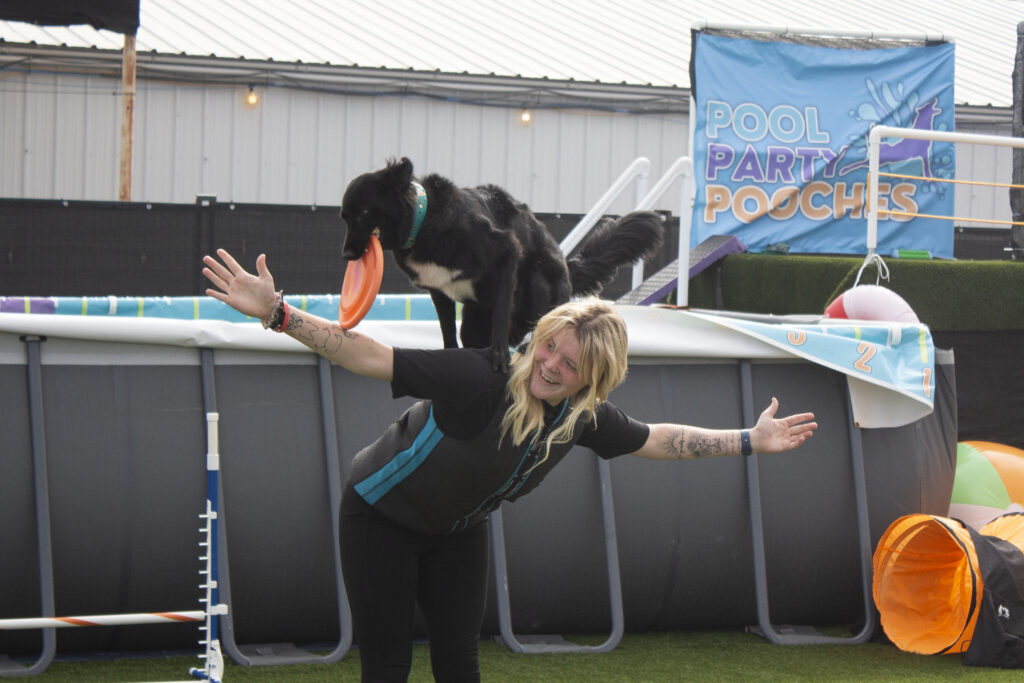 Macy and her dog, Daisy, perform tricks during the Pool Party Pooches event at the San Antonio Stock Show & Rodeo on Feb. 12. Photo by Daniel De Leon II.