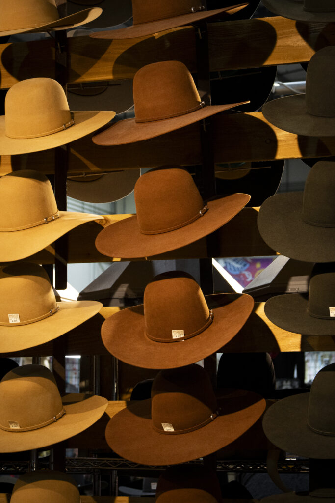 A display of hats at the Heads or Tails Hats Boutique entice customers at the San Antonio Stock Show and Rodeo Expo Hall Feb.12. Photo by Itzabel Lara.