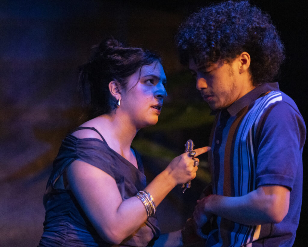 Kane Lopez, Lady Macbeth, and Isaiah Flores, Macbeth, in SAC’s production of a Narcos-inspired Macbeth. Photo by Janelle Alemán.