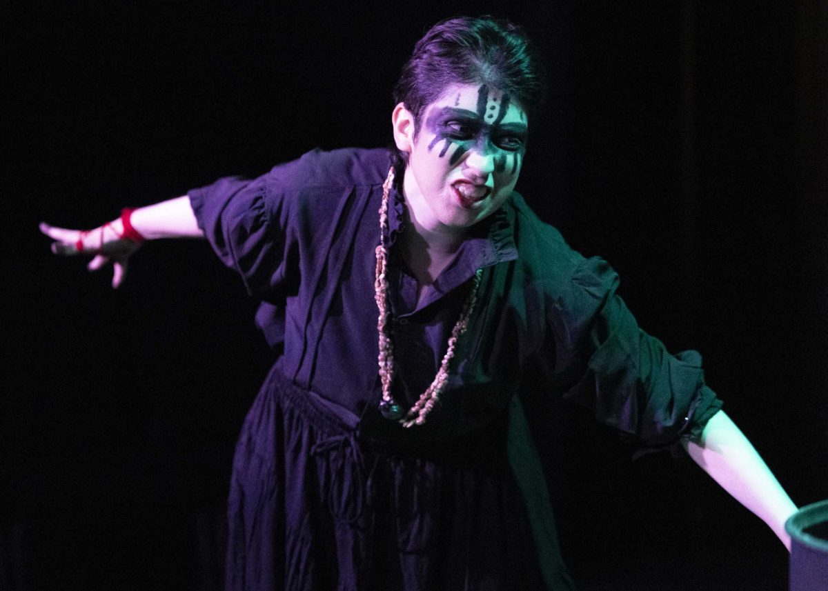 Elizabeth Potts, as one of the three brujas (Spanish for witches) in SAC’s production of a Narcos-inspired Macbeth. Photo by Janelle Alemán.