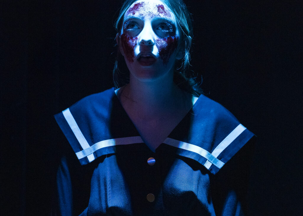 Kamryn Ewing portrays an apparition in SAC’s production of a Narcos-inspired Macbeth. Photo by Janelle Alemán.