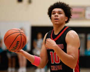 SAC Forward Kamirin Wiliams readied a free throw shot at Wednesday’s Pink Out game against Palo Alto. Photo by Janelle Aleman.