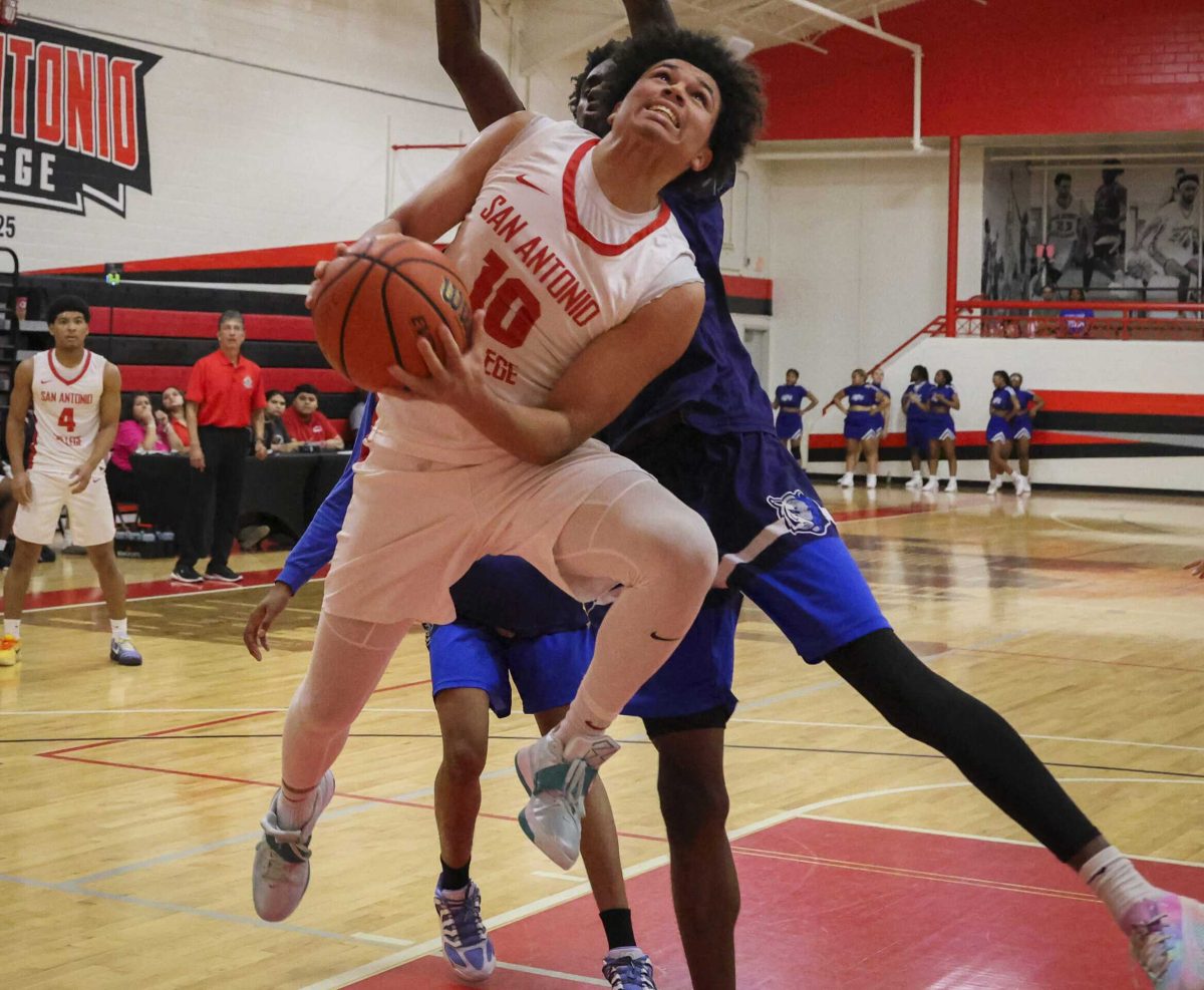 SAC Forward Karmirin Williams elevates for a layup against the Tigers Wednesday. Photo by Jacob R. Lopez.