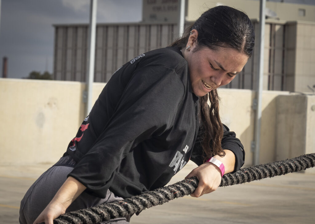 A competitor strains against the tire pull at Backyard Beast Oct. 24. Photo by Blake White.
