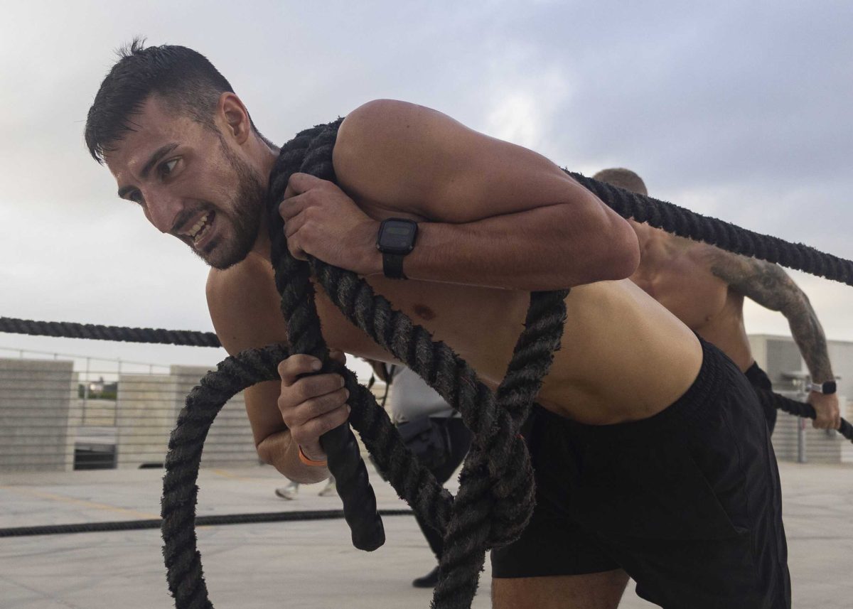 Members of Team OTF compete in the Backyard Beast competition Oct. 24. Photo by Chris Hernandez.