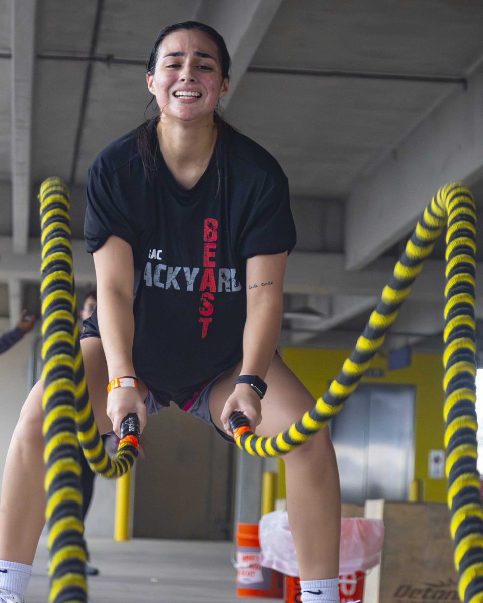 A competitor does rope slams during the Backyard Beast competition Oct. 24. Photo by Gene Molina.