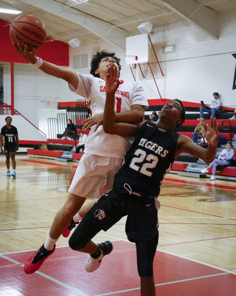 SAC Power Forward/Center Edgar Gomez flies into a layup at SAC’s Chandler Physical Education Center Wednesday. Photo by Thomas Solis.