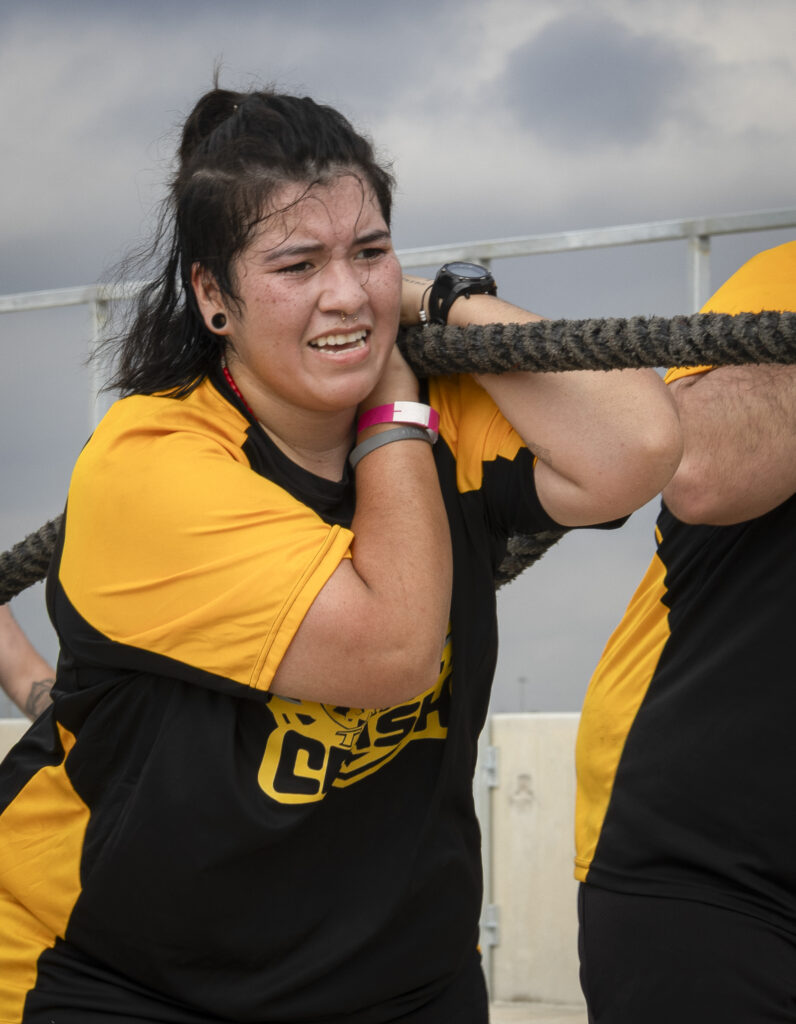 A competitor strains on the tire pull at Backyard Beast Oct. 24. Photo by Vanessa Wiggins.