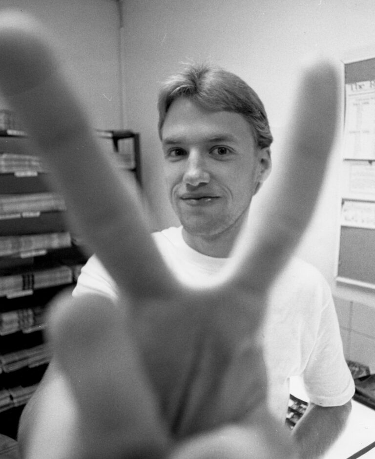 Ranger photo advisor Mark Magavern demonstrates to students how visual distortion works in wide-angle lenses. “The closer the subject, the more distortion there is,” he said. Archive photo.