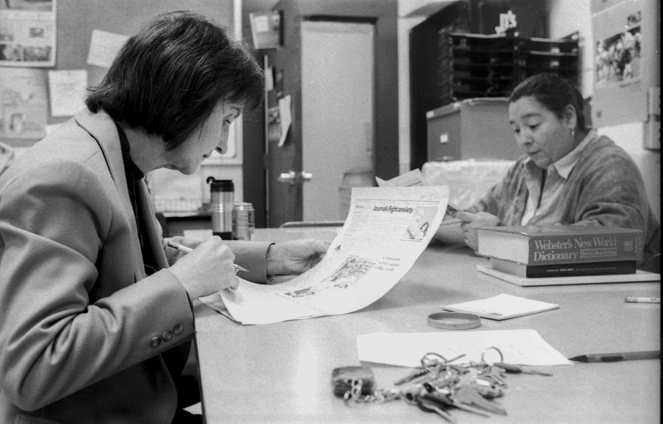 Marianne Odom and Irene Abrego, faculty advisors for the Ranger, edit stories in the newsroom. Faculty advisors read articles multiple times to ensure accuracy, which is of paramount importance in journalism. Archive photo.