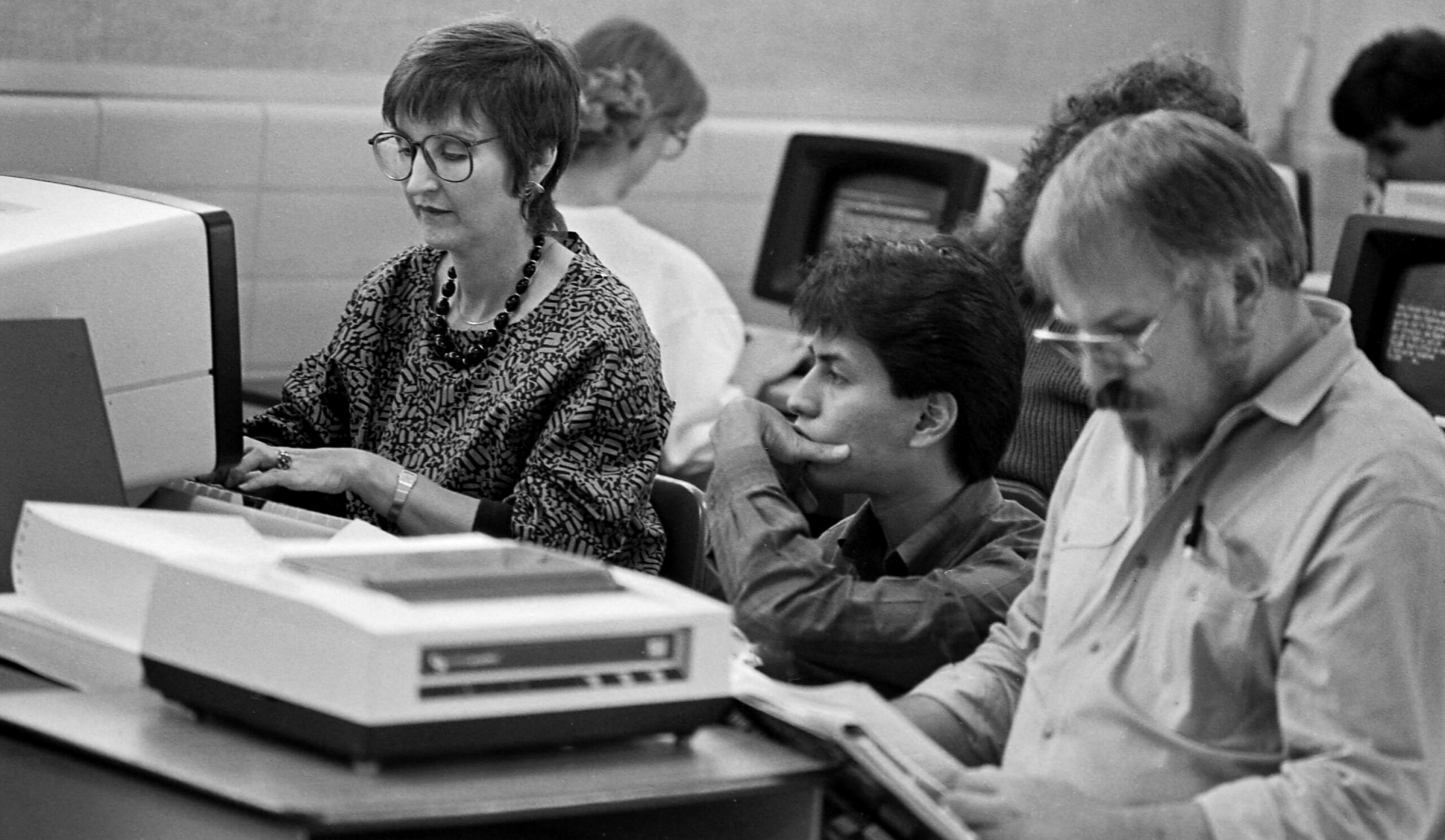 From left, Marianne Odom, Ranger Editor Russel Lopez, and former SAC Journalism Instructor “Dub” Daugherty, edit work for the Ranger, in this archive photo.