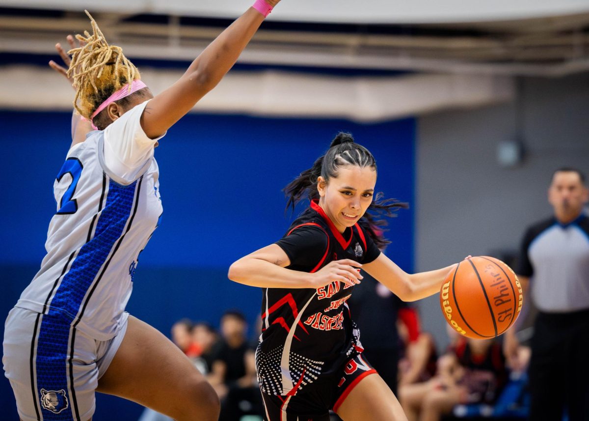 SAC guard Avah Castillo drives the ball up the court during Wednesday’s at William Allen Hudgins Heath and Wellness Building. Photo by Jacob R. Lopez.