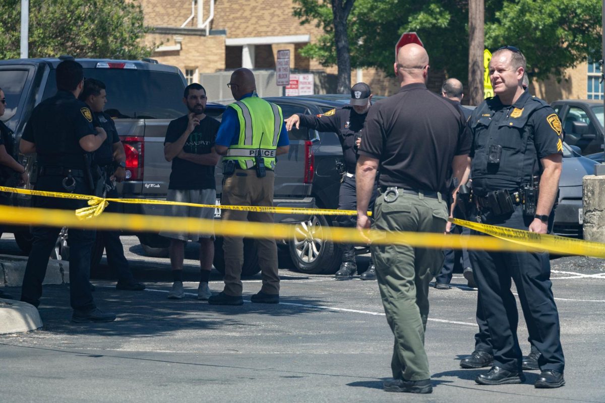 Police investigate a vehicle accident in which a man driving a gray Ford Explorer hit a woman outside of SAC's Fletcher Administration Building Monday afternoon. Photo by Catie Broadus.