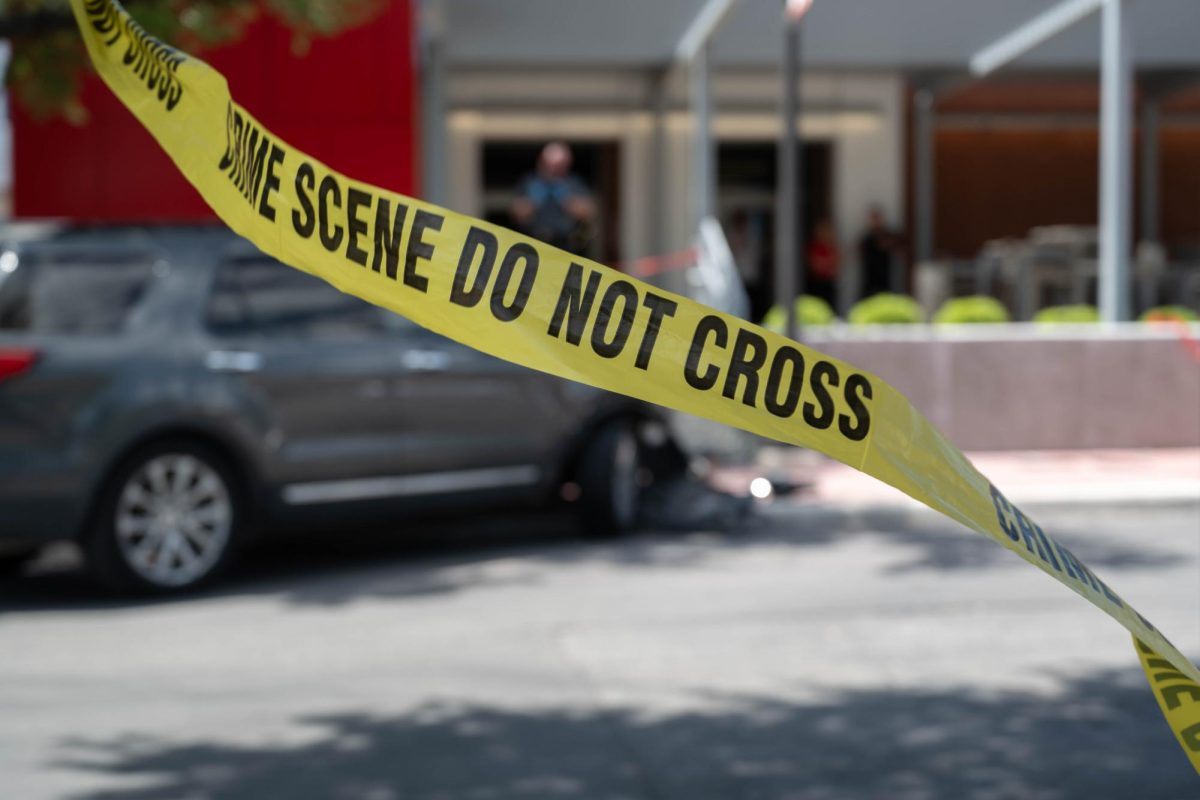 Police taped off the area where a man driving a gray Ford Explorer hit a woman outside of SAC's Fletcher Administration Building Monday afternoon. Photo by Catie Broadus.