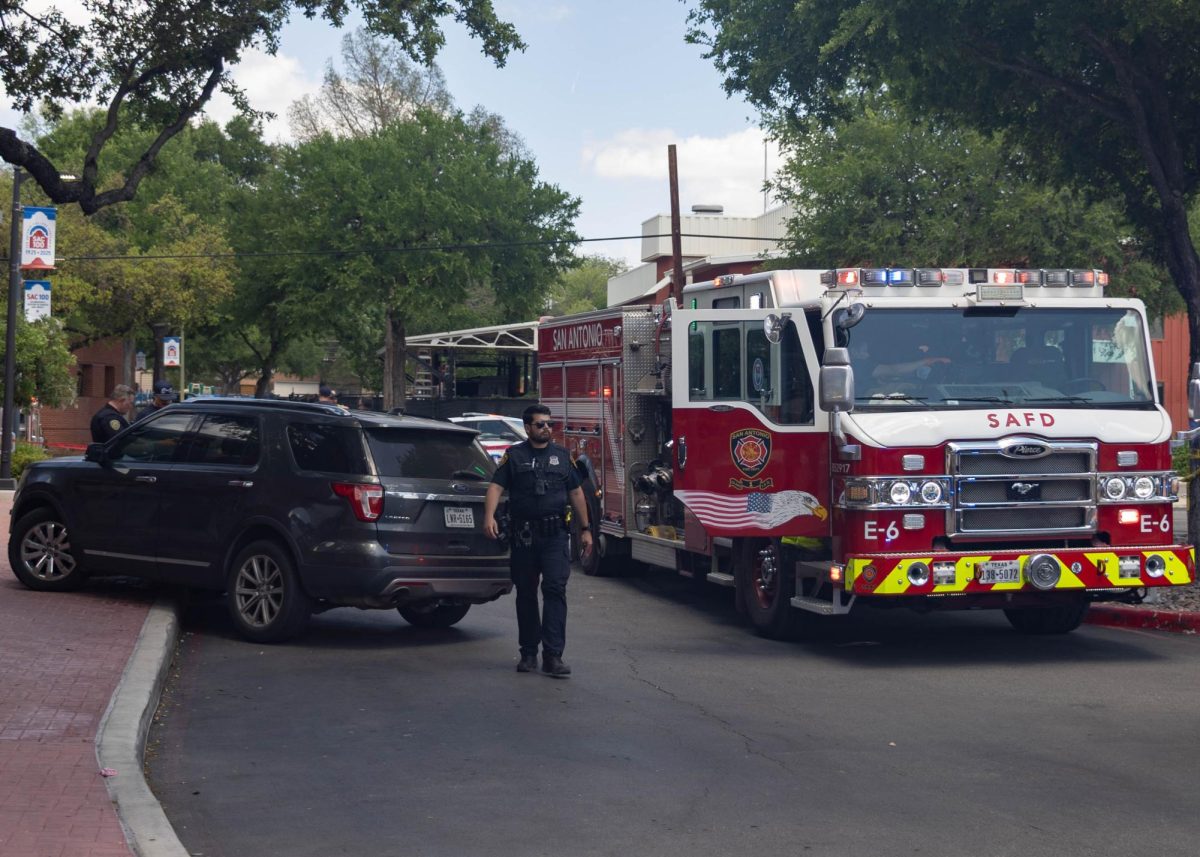 A firetruck sits behind the gray Ford Explorer that hit a woman outside of SAC's Fletcher Administration Building Monday afternoon. Photo by Catie Broadus.