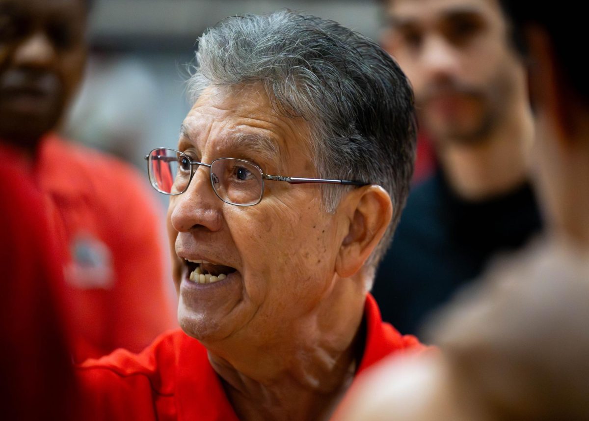 SAC head coach, Jimmy Alacala, strengthens the teams motivation against Palo Alto College on Wednesday at the Candler Physical Education building. (Janelle Alemán)