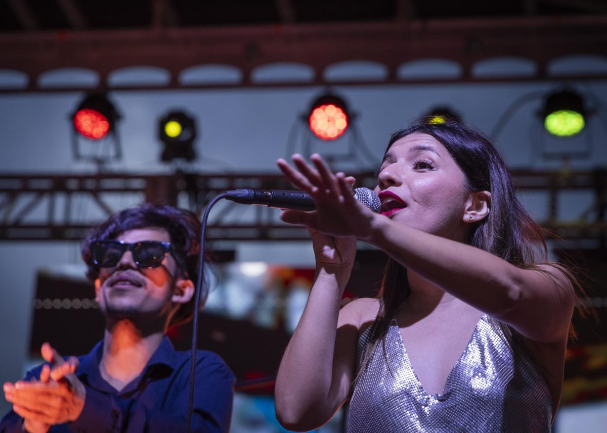 Members from Grupo Ma$$oro perform at Fredstock on Thursday