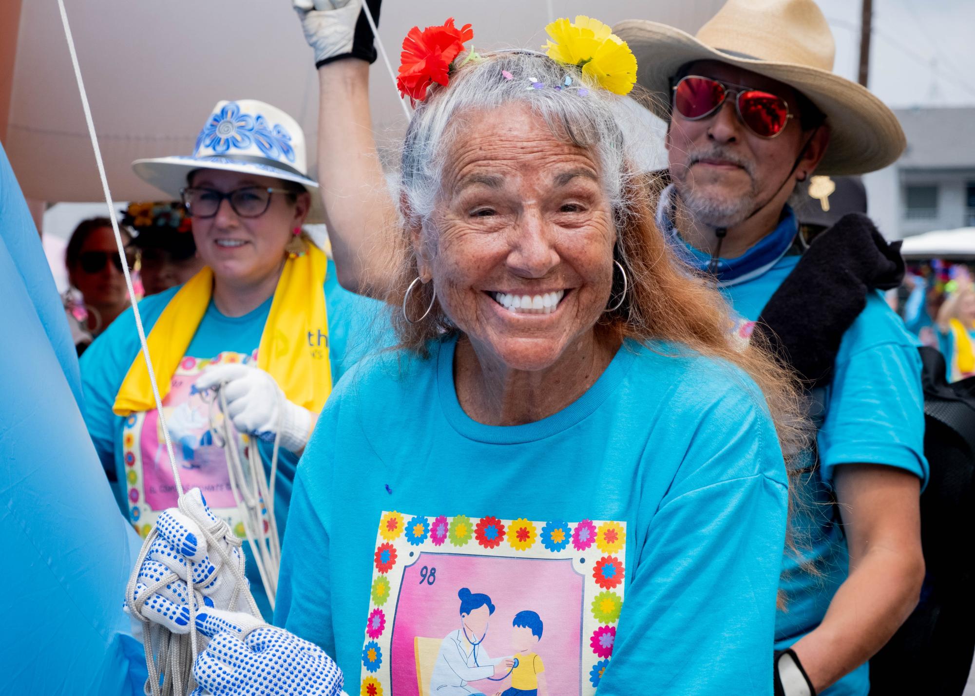 SAC Celebrates Centennial in Battle of Flowers Parade