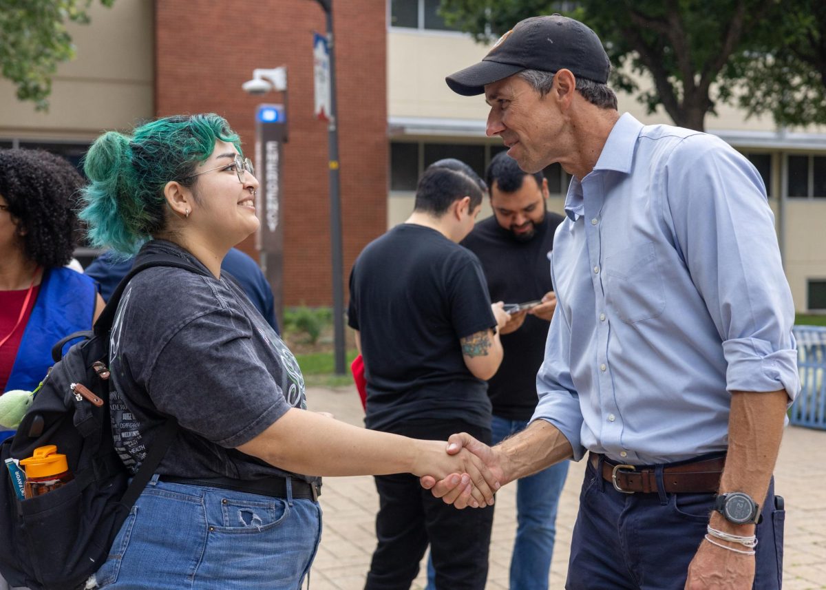 Music major Rita Alaniz introduces herself to Robert “Beto” O’Rourke while his Organization Powered by People Monday in the Free Speech Zone at San Antonio College.