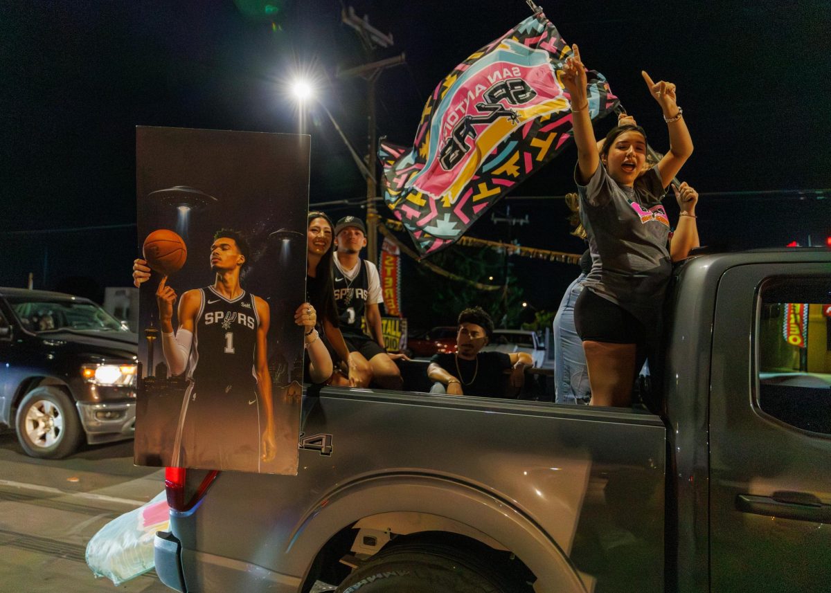 Spurs fans celebrate after a Spurs win with the long-time tradition of honking. 