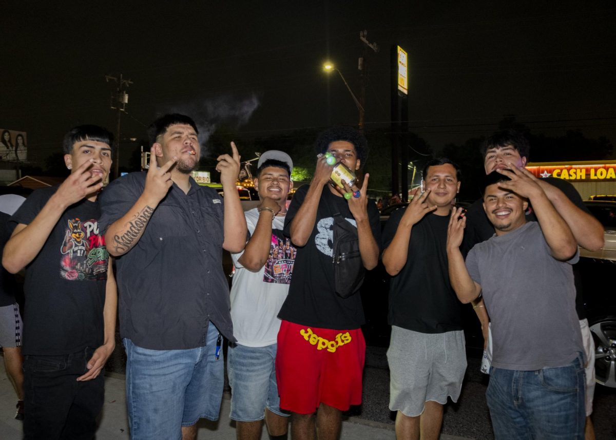San Antonio Spurs fans gather on Southwest Military Drive, honking up and down the street after a historic Game 1 win on Monday. 