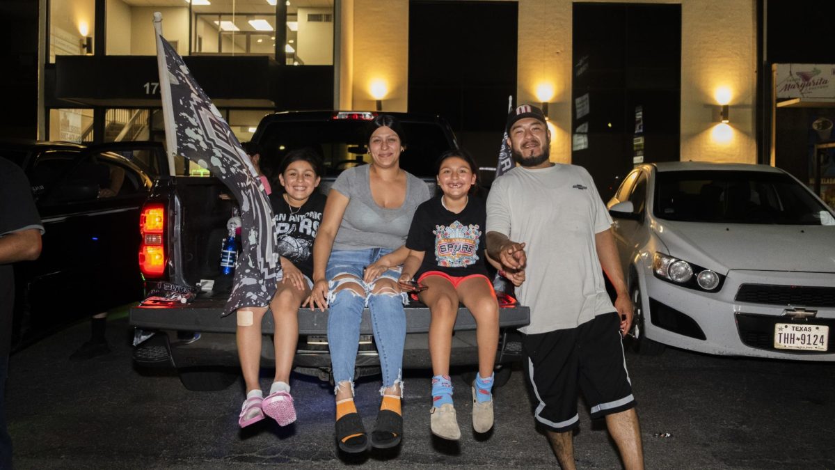 San Antonio Spurs fans gather on Southwest Military Drive, honking up and down the street after a historic Game 1 win on Monday. 