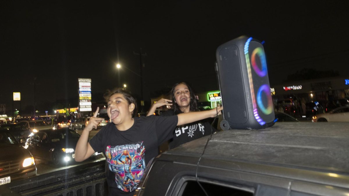 San Antonio Spurs fans gather on Southwest Military Drive, honking up and down the street after a historic Game 1 win on Monday. 