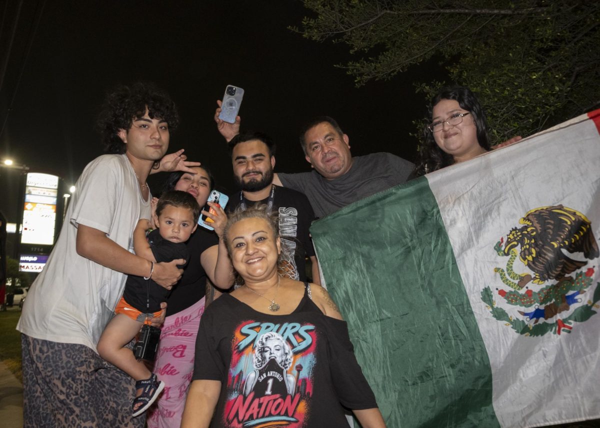 San Antonio Spurs fans gather on Southwest Military Drive, honking up and down the street after a historic Game 1 win on Monday. 