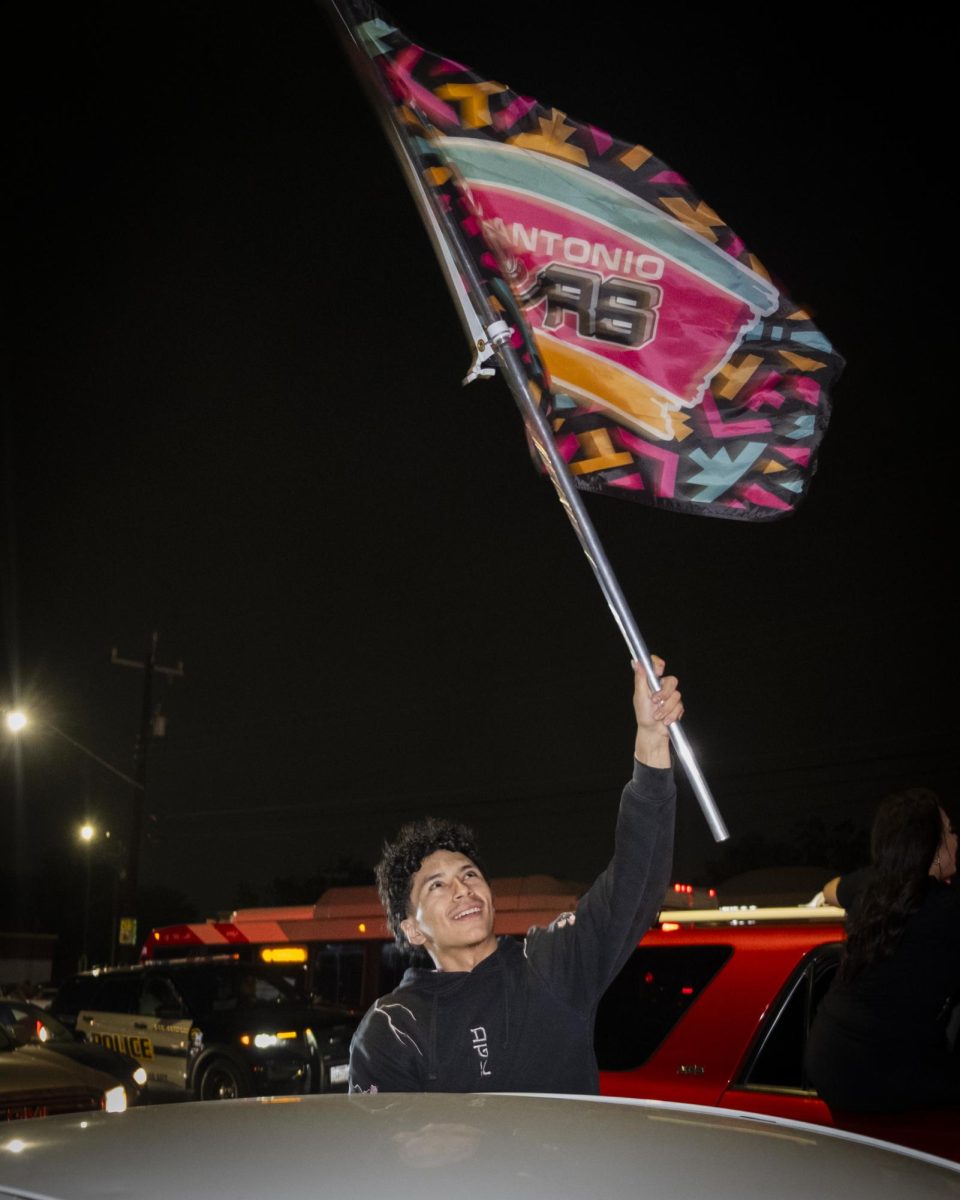 San Antonio Spurs fans gather on Southwest Military Drive, honking up and down the street after a historic Game 1 win on Monday. 