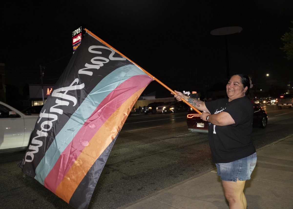 San Antonio Spurs fans gather on Southwest Military Drive, honking up and down the street after a historic Game 1 win on Monday. 
