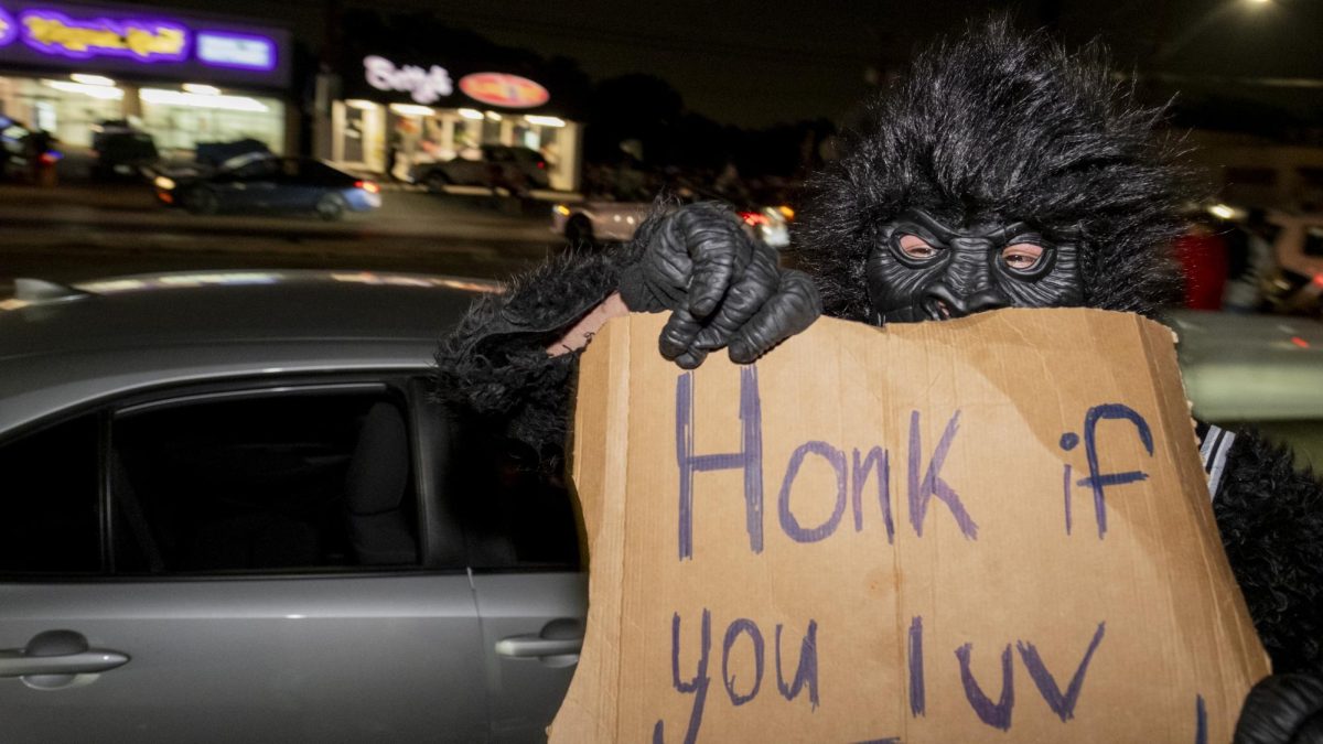 San Antonio Spurs fans gather on Southwest Military Drive, honking up and down the street after a historic Game 1 win on Monday. 