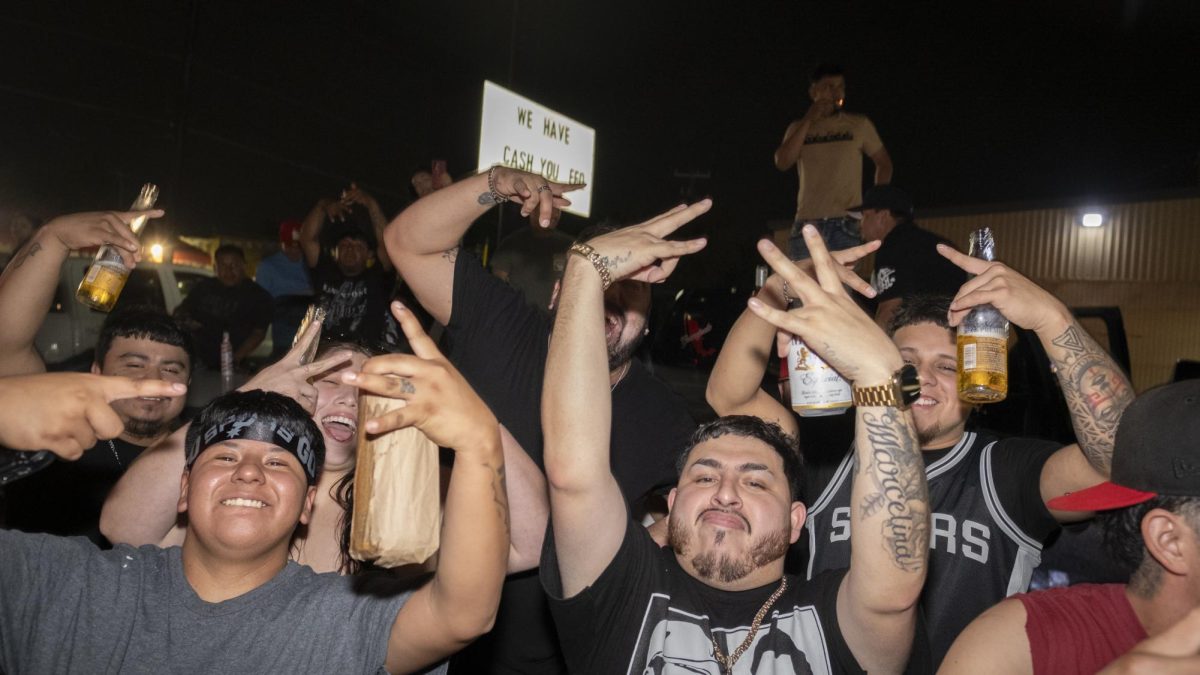 San Antonio Spurs fans gather on Southwest Military Drive, honking up and down the street after a historic Game 1 win on Monday. 