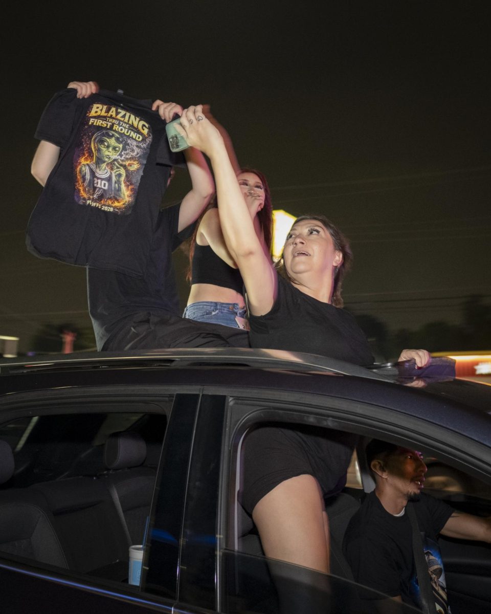 San Antonio Spurs fans gather on Southwest Military Drive, honking up and down the street after a historic Game 1 win on Monday. 