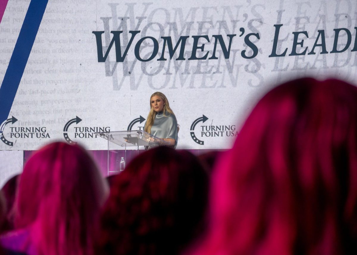 CEO of Turning Point USA Erika Kirk speaks at the Women's Leadership Institute at the Marriott Rivercenter Friday. 